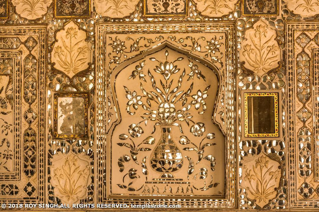 We are exploring the beautiful frescos of Amer Fort. This mirror and marbles fre…