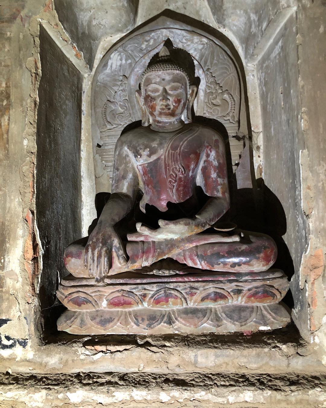 A 12th century Buddha statue in Naga Yon Hpaya temple. This temple is an active …