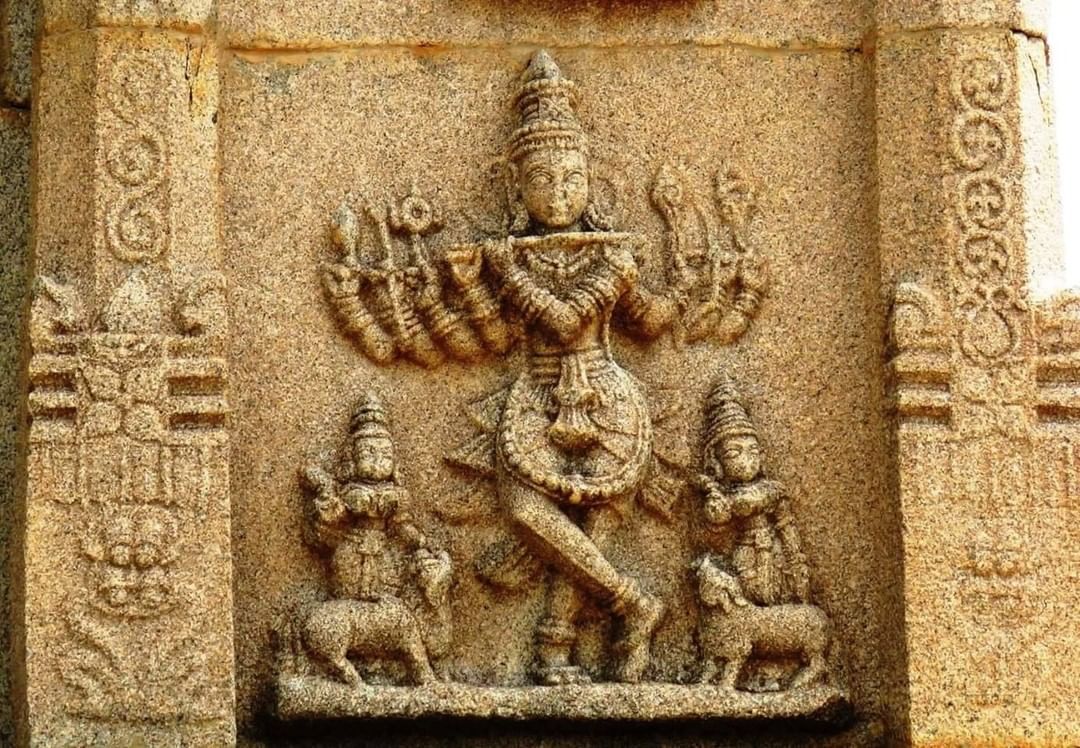 A beautiful Eight-armed Krishna playing flute in the Hazararama temple, #Hampi, …